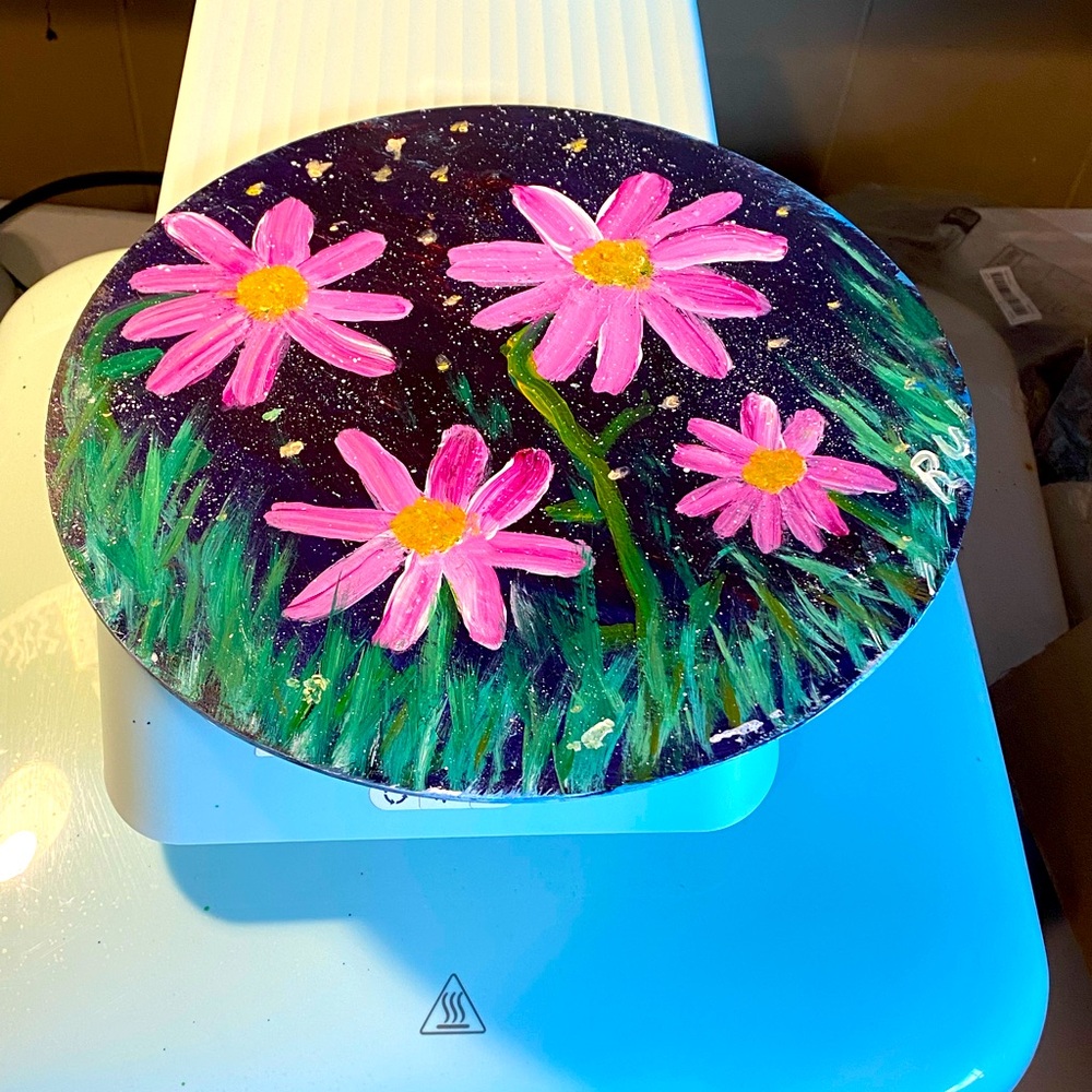 Double sided acrylic painting on a wood circle bored